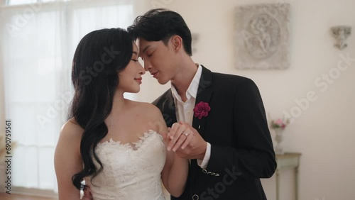 Unspoken Bond, An Asian Couple Tender Moment on Their Wedding Day
