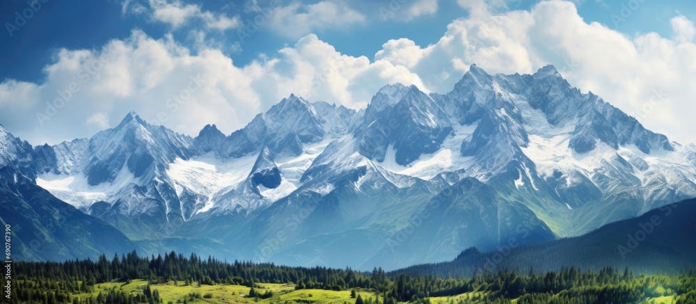 View of mountain peaks in spring time in High Tatras. Copyspace image. Header for website template - obrazy, fototapety, plakaty 