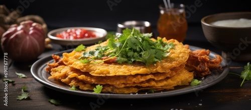 Taco de Carnitas Cornmeal tortilla with deep fried pork Traditional Mexican appetizer commonly accompanied by cilantro onion and hot sauce. Copyspace image. Header for website template