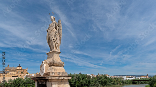 Statue of Saint Raphael in the middle of the Roman Bridge in Córdoba, Spain © EMILIA