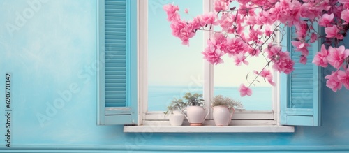 Window with closed blue shutters with heart shaped cuts and bougainvillea flowers French Riviera South of France. Copyspace image. Square banner. Header for website template photo