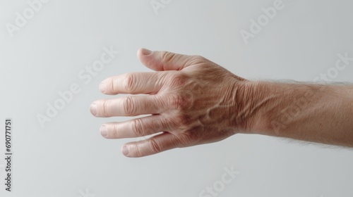 A person's hand against a clean white background. Versatile for various uses
