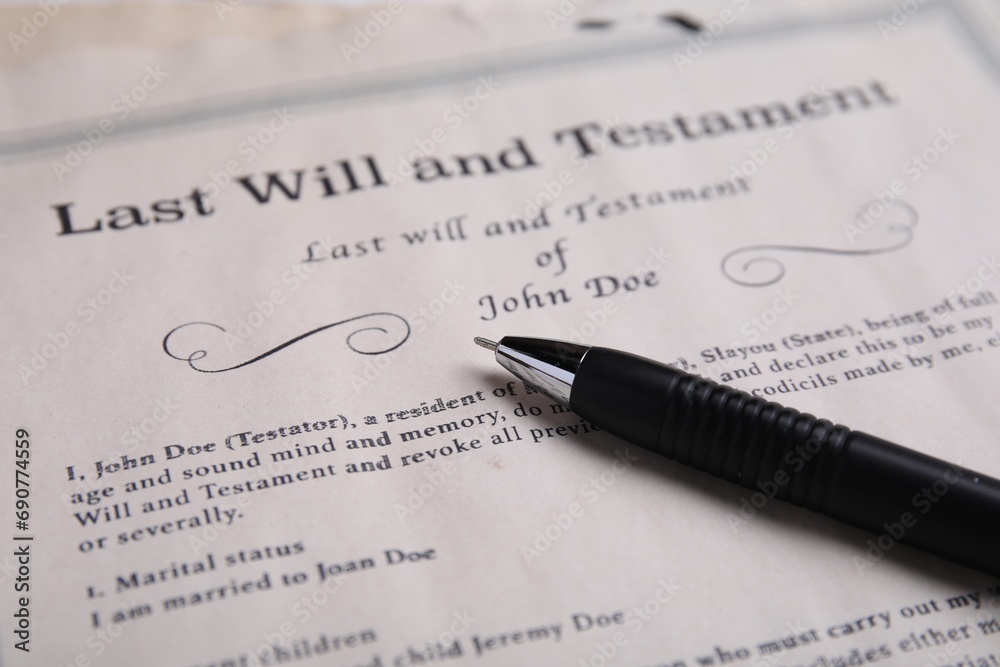 Last will and testament with pen on table, closeup Last will and testament with pen on table, closeup