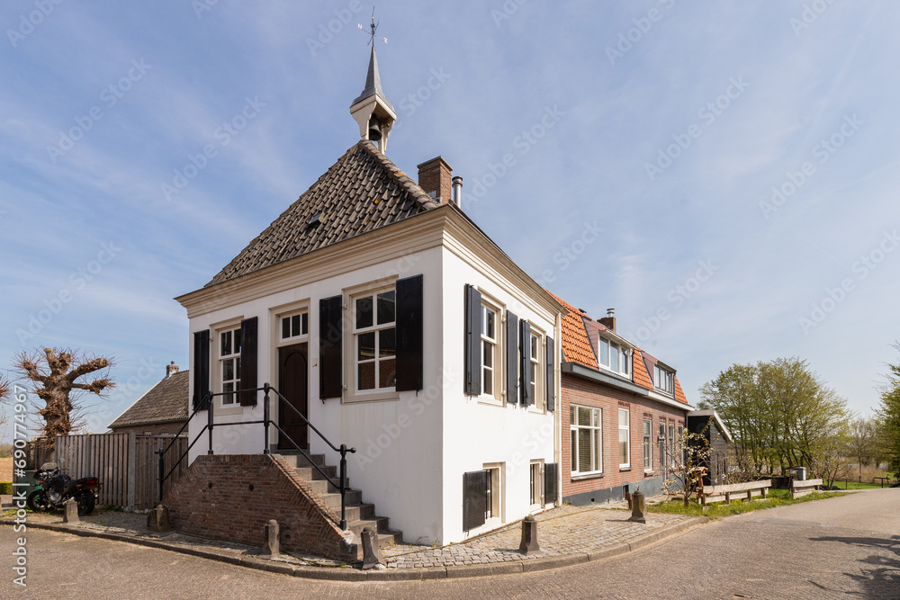 White polder house in the village of Acquoy in Gelderland.