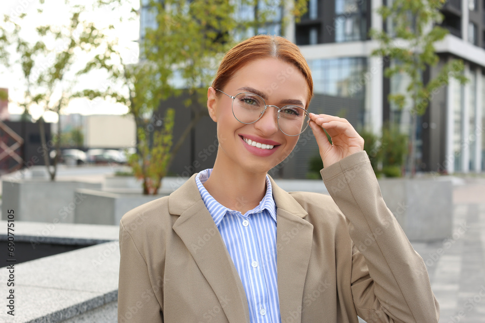 Portrait of beautiful woman in glasses outdoors Portrait of beautiful woman in glasses outdoors