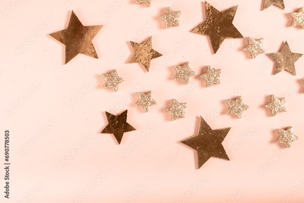 Christmas flat lay border with golden decorations, top view with copy space in the color of Peach Fuzz Christmas flat lay border with golden decorations, top view with copy space in the color of Peach Fuzz