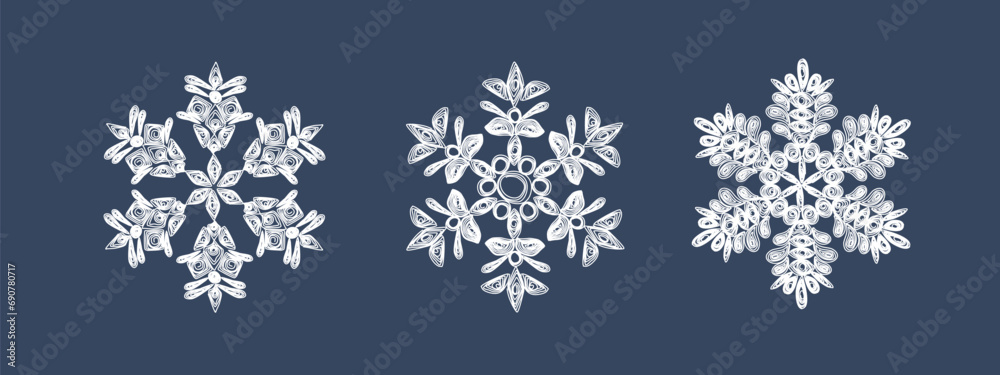 A set of stylish white quilling snowflakes on a dark blue background. Paper openwork weaving technique. Elements of quilling. New Year's symbols in the pattern. A set of stylish white quilling snowflakes on a dark blue background. Paper openwork weaving technique. Elements of quilling. New Year's symbols in the pattern.