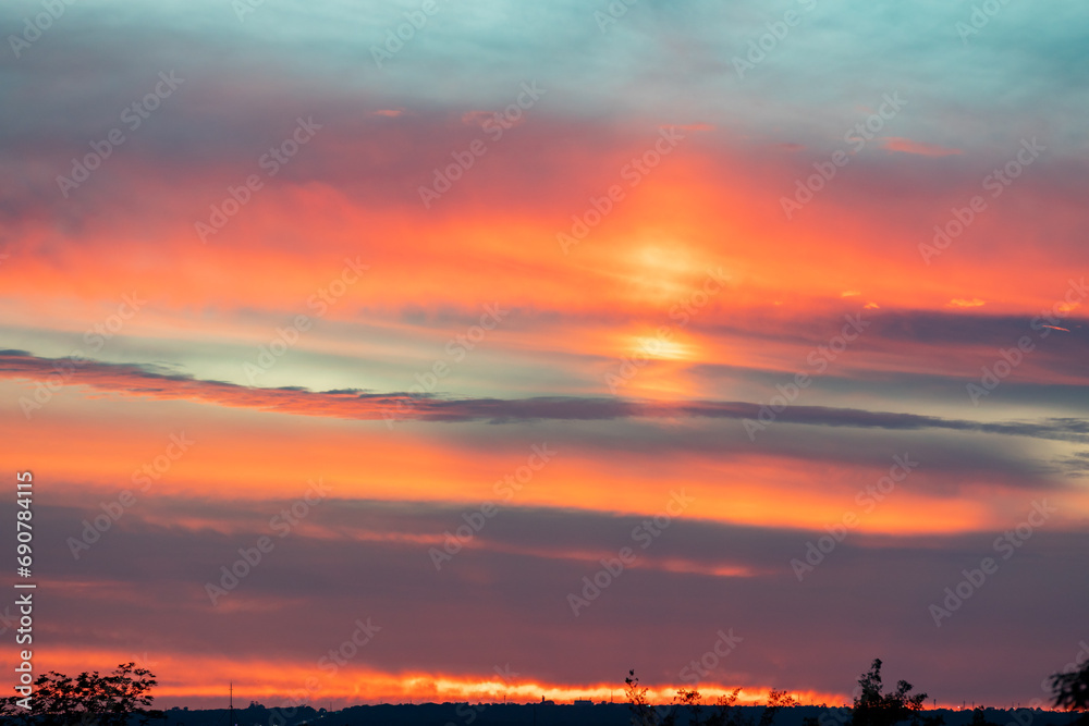 Wonderful sky at dawn with orange, yellow and red colors