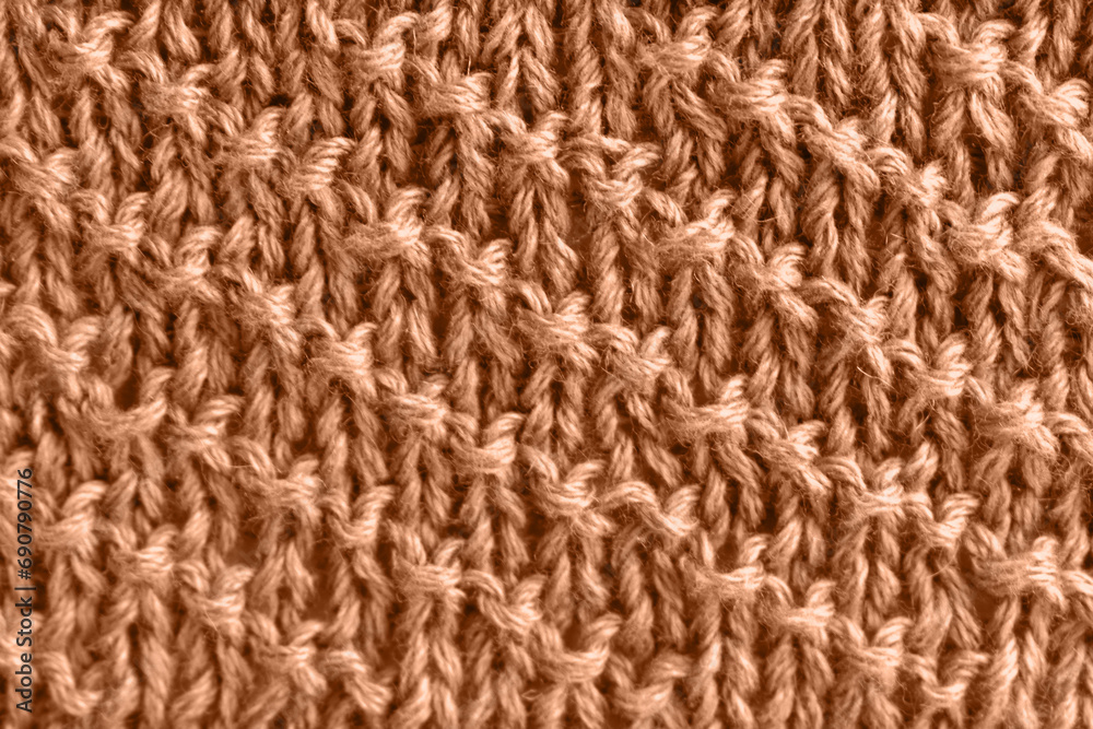 Peach wool knit with diagonal stripes. Color of the year 2024 Peach wool knit with diagonal stripes. Color of the year 2024