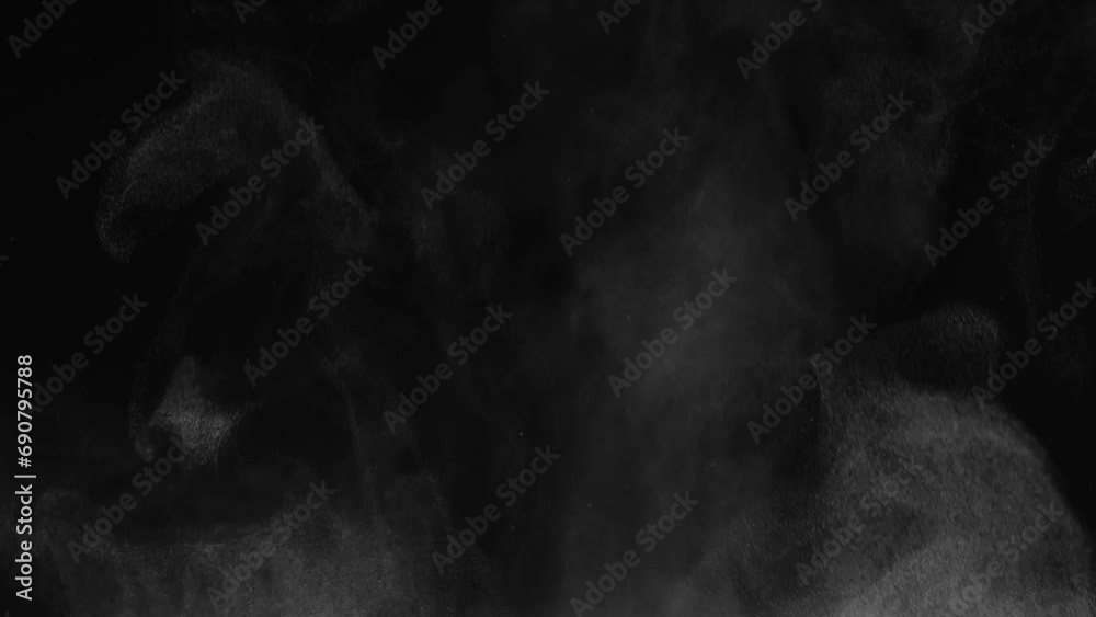 White steam from hot food or drink. White steam on a black background rises to the top. Cooking a hot meal in the kitchen.