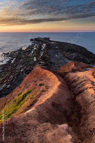 Sunrise at Filey Brigg on the North Yorkshire Coast photo