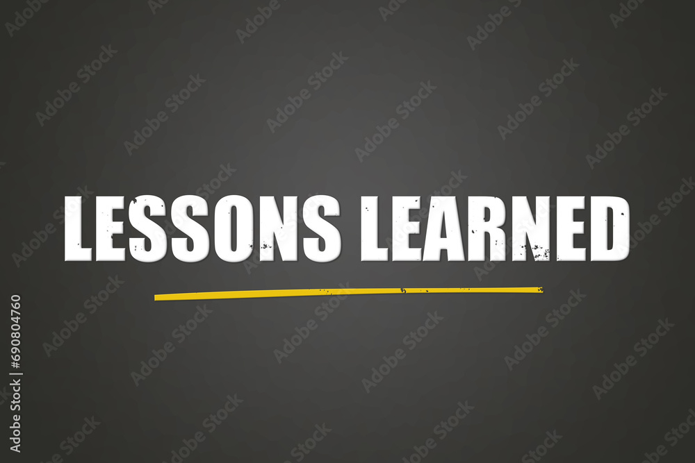 Fototapeta premium Lessons Learned. A blackboard with white text. Illustration with grunge text style.