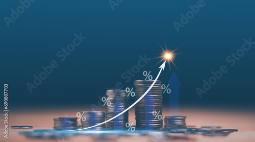 Stack of coins on wooden table with percentage and arrow up icon for interest rate of business growth, Percentage for increasing interest rate and inflation concept, investment, percent commission.