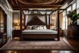 A luxurious bedroom featuring a canopy bed, rich tapestries, and Venetian plaster walls