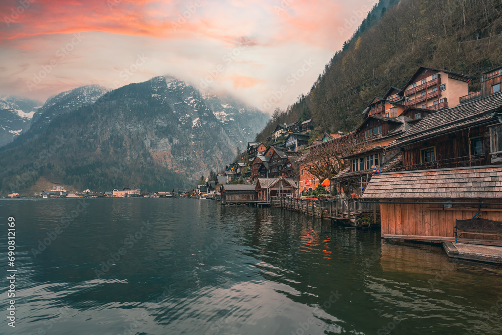 Fototapeta premium Great promotional photos of Austrian dream town Hallstatt landscapes with fantastic sunset colors and clouds in winter season