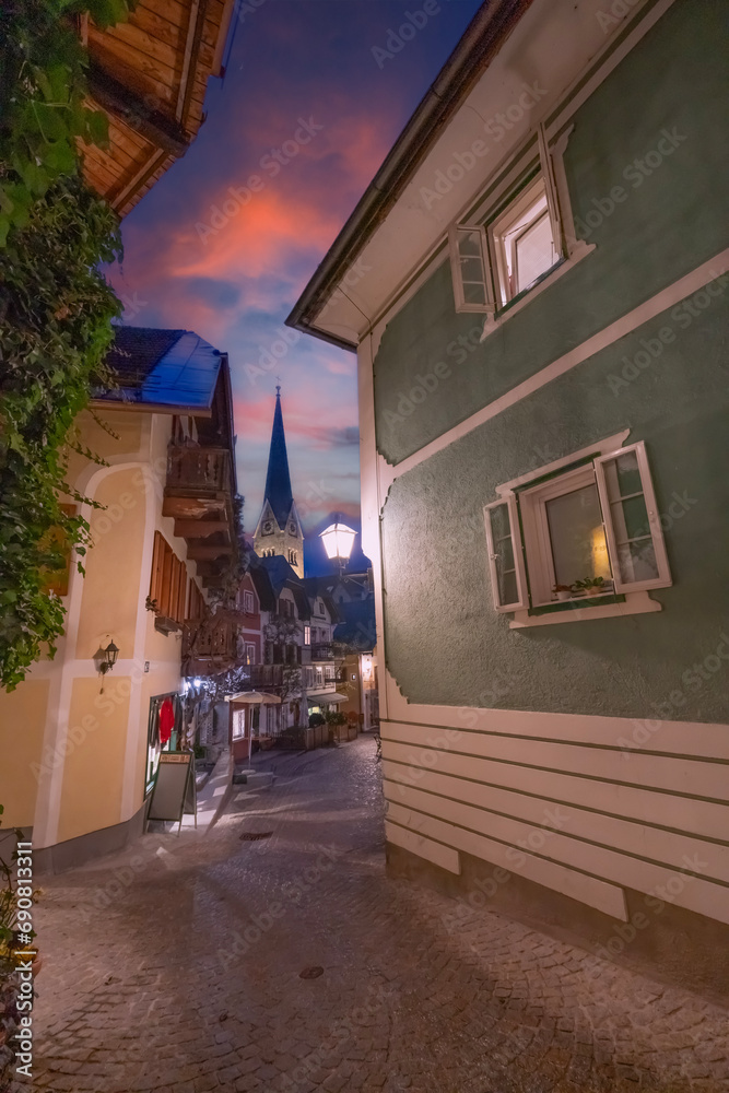 Great promotional photos of Austrian dream town Hallstatt landscapes with fantastic sunset colors and clouds in winter season