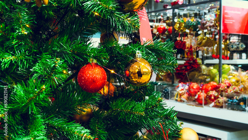christmas tree with baubles lights and decorations