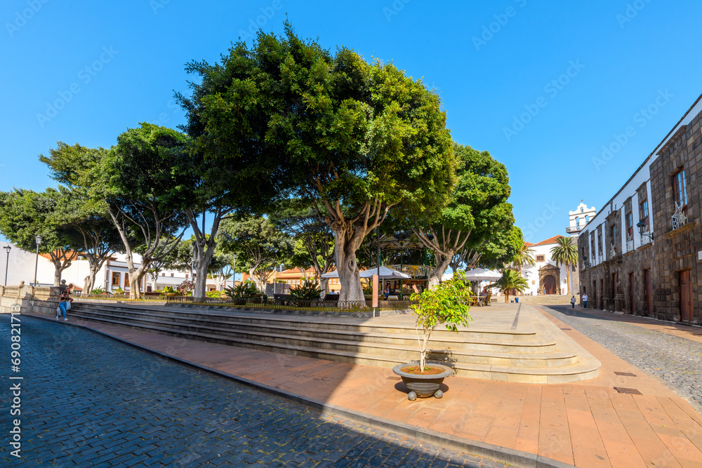 The Plaza de la Libertad, a popular and historic open plaza in the center of the village of Garachico, Santa Cruz de Tenerife, Spain. One of the Canary Islands. The Plaza de la Libertad, a popular and historic open plaza in the center of the village of Garachico, Santa Cruz de Tenerife, Spain. One of the Canary Islands.