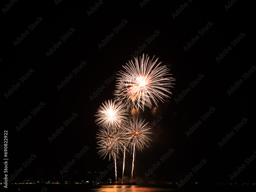 Fireworks Night Sky Abstract Black Background Light Travel Party Fire Happy New Year Celebration Red Orange Color Card Mockup Holidays Effect Light Bright River Sea Scene, Festival Pattaya Thainland. Fireworks Night Sky Abstract Black Background Light Travel Party Fire Happy New Year Celebration Red Orange Color Card Mockup Holidays Effect Light Bright River Sea Scene, Festival Pattaya Thainland.