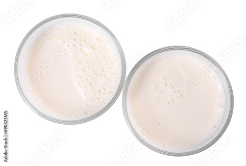 Glasses of fresh milk isolated on white, top view
