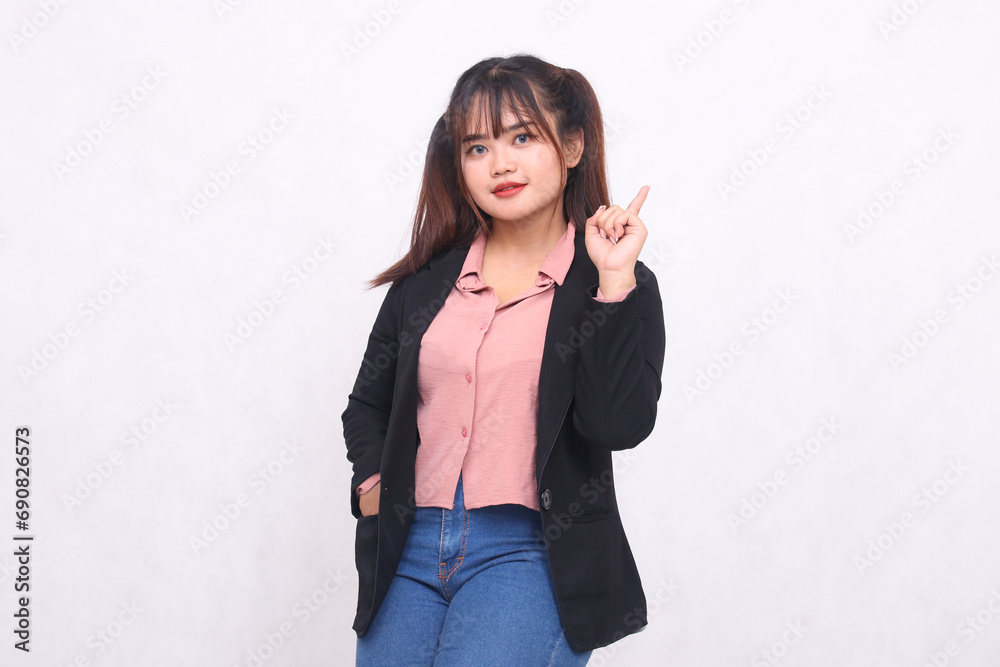 Beautiful Asian businesswoman in suit standing confidently pointing hand up on white background studio portrait for advertising materials, banners, billboards, job vacancies, business opportunities Beautiful Asian businesswoman in suit standing confidently pointing hand up on white background studio portrait for advertising materials, banners, billboards, job vacancies, business opportunities