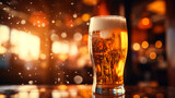 close up of a glass of beer with a defocused background with bokeh lights