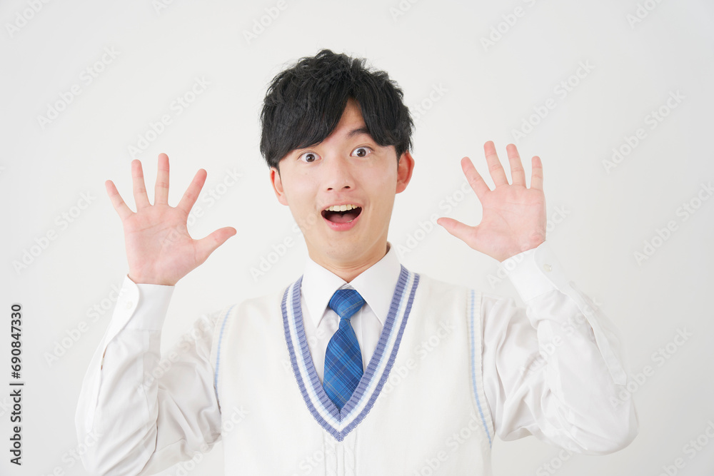 驚く男子高校生　白背景