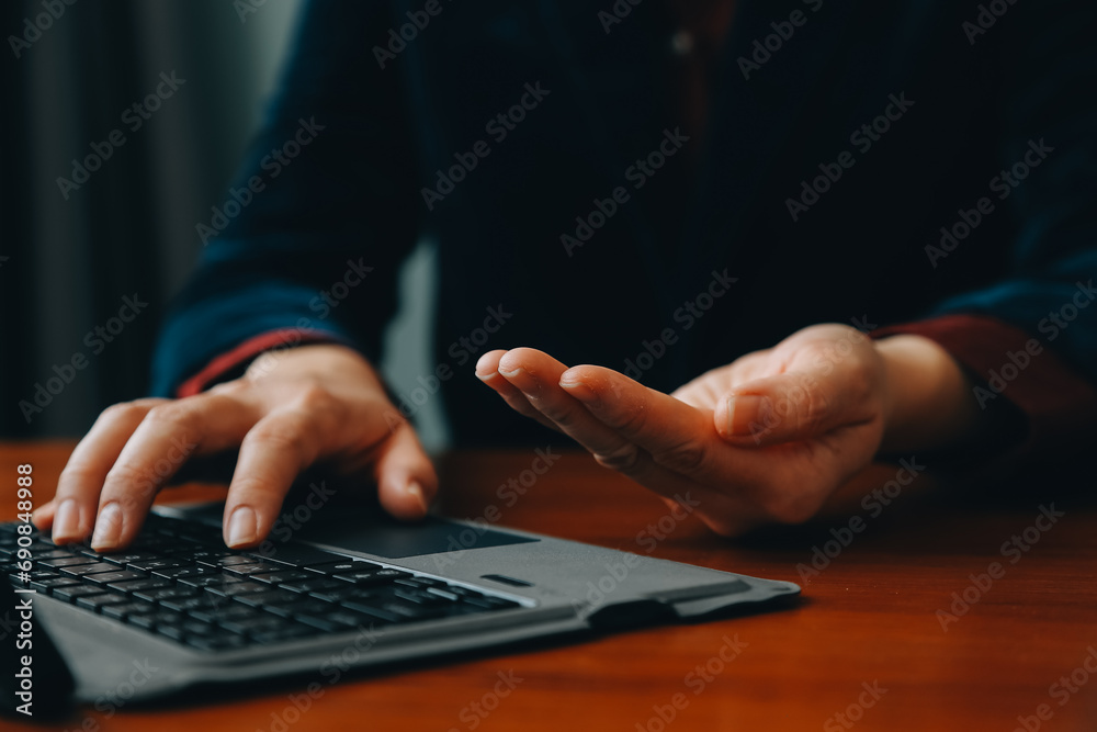 Corporate Communication. Asian Businesswoman Talking On Mobile Phone Working On Laptop In Modern Office. Free Space Corporate Communication. Asian Businesswoman Talking On Mobile Phone Working On Laptop In Modern Office. Free Space