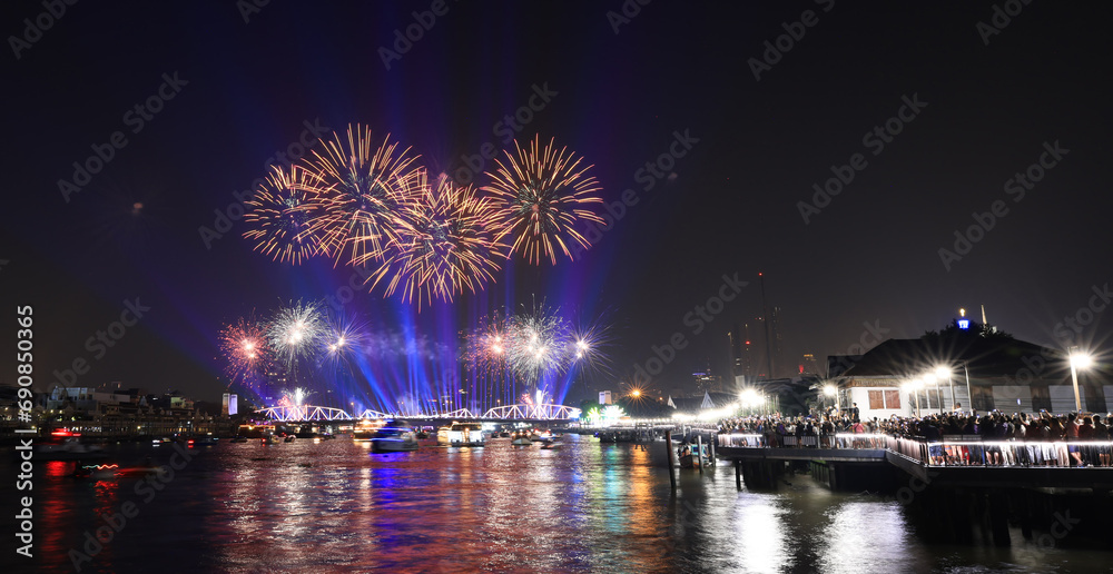 Light and firework show over the old steel bridge ,Phra Phuttha Yodfa Bridge at Bangkok, Thailand Theme Vijit Chao Phraya 2023 Bangkok Thailand Light and firework show over the old steel bridge ,Phra Phuttha Yodfa Bridge at Bangkok, Thailand Theme Vijit Chao Phraya 2023 Bangkok Thailand