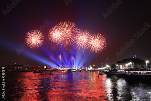 Light and firework show over the old steel bridge ,Phra Phuttha Yodfa Bridge at Bangkok, Thailand Theme Vijit Chao Phraya 2023 Bangkok Thailand