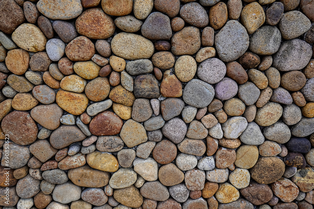 The background of pebbles Stones beach texture The background of pebbles Stones beach texture
