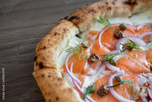 Close up of Smoked Salmon Pizza on the table.