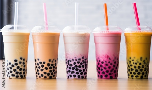 Flavoured Bubble Boba tea, smoothie with tapioca pearls, in plastic cups with straws. Generative AI