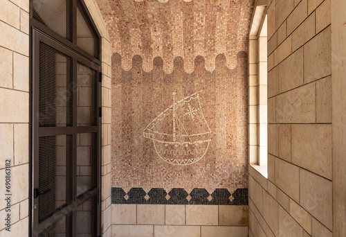 Decorative mosaic depicting a sailing boat on the wall of the Church of the Annunciation in the Nazareth city in northern Israel