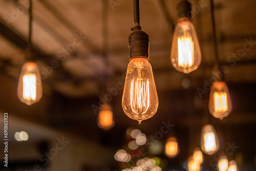 Group of Hanging Edison light bulb, also known as filament light bulb photo
