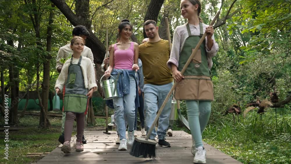 Group of volunteers on their way to cleaning the forst from plastic garbage. Group of volunteers on their way to cleaning the forst from plastic garbage.