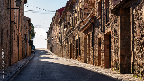 Access road to the old town of Siguenza with old stone houses lined up, Spain. photo