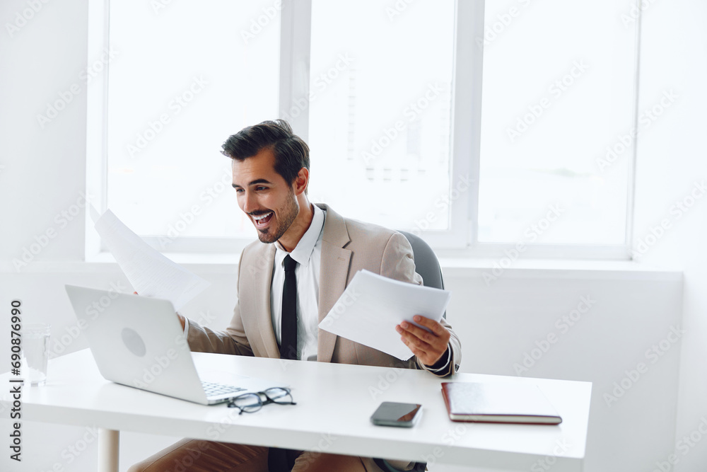 Laptop document entrepreneur suit winner office company paper holding businessman employee planning happy