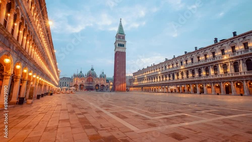 St. Mark's Square in Venice, Veneto, is one of the most important monumental squares in the world. Timelapse from night to day photo