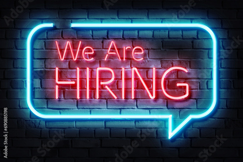 We Are Hiring Neon Sign Illustration on a dark background