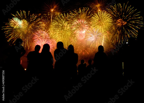 People in Silouttee enjoy watching fireworks show