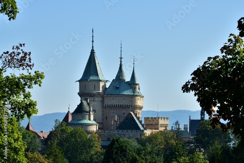 Obraz na płótnie View from behind the trees of the old walls castle Bojnice Slovakia w salonie
