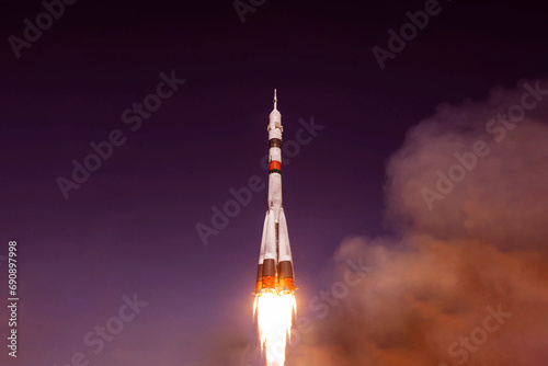 Fototapeta Naklejka Na Ścianę i Meble -  Rocket launch into space. Elements of this image furnished by NASA