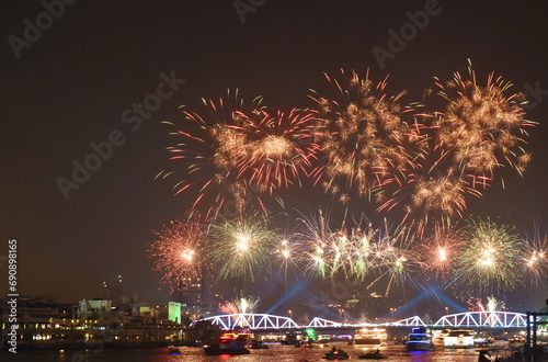 celebration fireworks and lighting at Phra Phuttha Yodfa memorial bridge Cho Phraya river in Thailand  photo