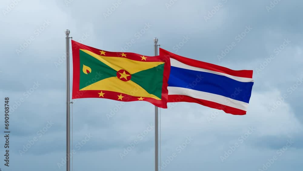 Kingdom of Thailand and Grenada flag waving together on cloudy sky, endless seamless loop, two country cooperation concept Kingdom of Thailand and Grenada flag waving together on cloudy sky, endless seamless loop, two country cooperation concept