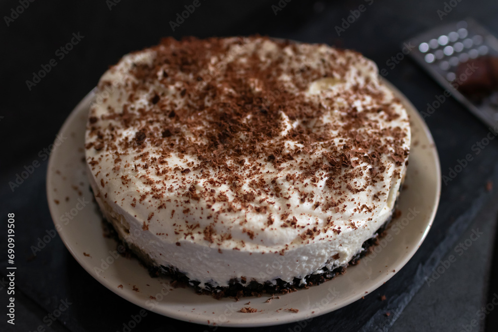 Classic banoffee pie a simple cookie crust is filled with thick caramel, slices of fresh banana and whipped cream on top. Classic banoffee pie a simple cookie crust is filled with thick caramel, slices of fresh banana and whipped cream on top.