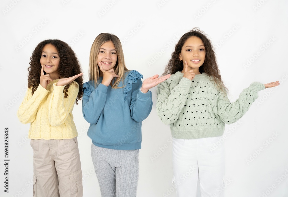 Funny Three beautiful multiracial kid girls hold open palm new product great proposition Funny Three beautiful multiracial kid girls hold open palm new product great proposition