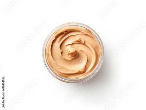 Creamy peanut butter isolated on white background