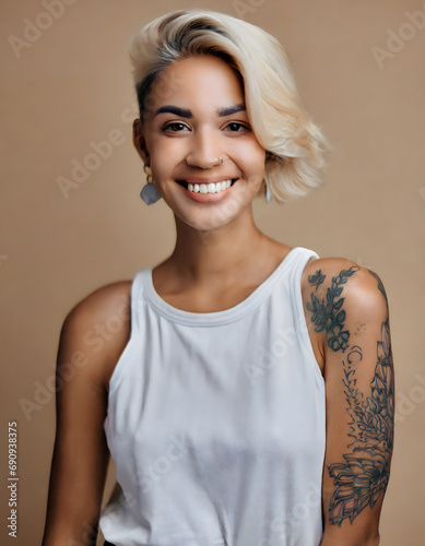 Blonde girl with tattoos smiling