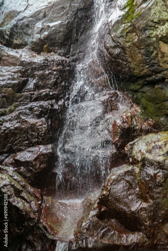 Waterfall in the forest, beautiful natural background, long exposure.
